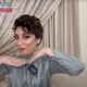 The TikToker Tala Safwan appears posing with her hands under her face in a YouTube video.